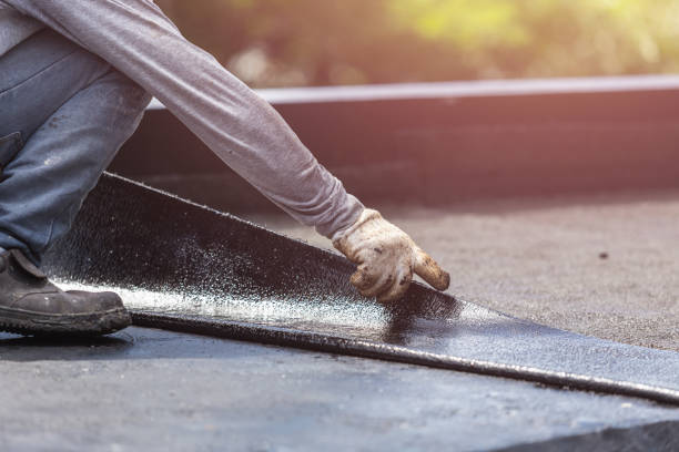 Professional Basement Waterproofing technician working in Mansfield, PA